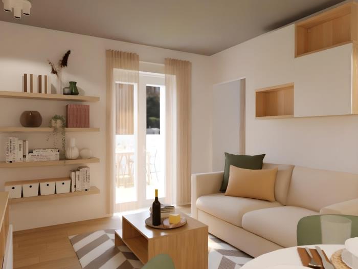 Salón moderno y luminoso con luz natural, decoración elegante y ambiente acogedor.